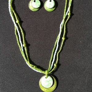 Green beaded necklace w/ matching earrings.